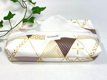 Load image into Gallery viewer, Cotton dispenser box in a Geometric pattern with 12 White cotton handkerchiefs folded inside
