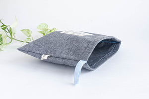 Grey Chambray square bag with printed off-white logo showing Eiffel Towel