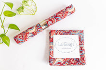 Charger l'image dans la galerie, 2 Red Paisley Napkins one is folded in a square and one is rolled