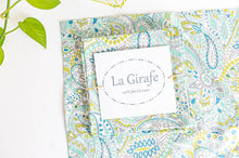 Charger l'image dans la galerie, One Green Paisley napkin folded in a square on top of a flat a Green Paisley napkin