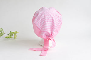 Back Side view of Scrub hat Small White Dots on Pink and Pink Stripes on top part