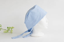 Load image into Gallery viewer, Side view of a Blue Cloth Scrub hat
