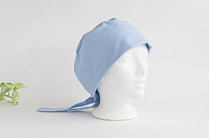Side view of a Blue Cloth Scrub hat
