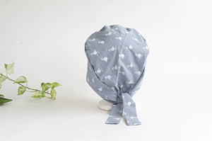 Back view of Cloth scrub hat with White Flamingo pattern on light Grey ground