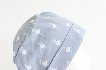 Charger l'image dans la galerie, Close up of Cloth scrub hat with White Flamingo pattern on light Grey ground
