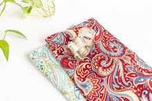 Charger l'image dans la galerie, One Red Paisley Napkin folded on top of one Green Paisley Napkin