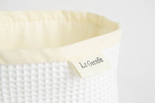 Load image into Gallery viewer, Close up of a basket in White Waffle cotton to hold used hankies
