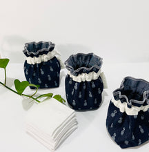 Charger l'image dans la galerie, Three Pouches made of Denim with Pineapple pattern with a stack of white makeup remover pads