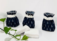 Charger l'image dans la galerie, Three Pouches made of Denim with Pineapple pattern with a stack of white makeup remover pads