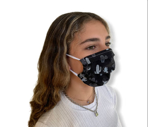 Teen girl wearing a White Cactus on Black ground face mask