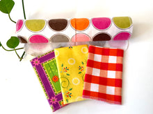 Charger l'image dans la galerie, Three folded towels and one rolled towel with Plaids, Circles and Floral patterns