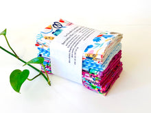 Charger l'image dans la galerie, A stack of folded towels with Butterfly, Checks and Garden patterns
