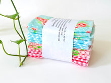 Charger l'image dans la galerie, A stack of folded towels with Roses and Checks patterns in Blue and Pink
