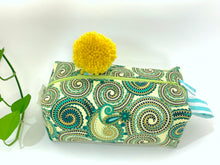 Load image into Gallery viewer, Side view of rectangular Cosmetic bag with Green Paisley printed pattern and Yellow Pompon
