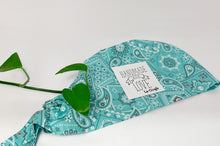 Load image into Gallery viewer, Folded Aqua Western Paisley Scrub Cap