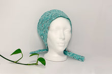 Load image into Gallery viewer, Left view of Aqua Western Paisley Scrub Cap