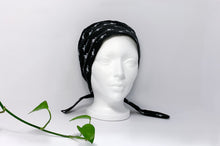Load image into Gallery viewer, Front view of Scrub Cap with White Flamingo print on Black ground