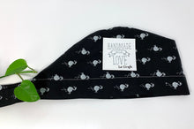 Load image into Gallery viewer, Folded Scrub Cap with White Flamingo print on Black ground