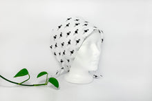 Load image into Gallery viewer, Semi Right view of Scrub Cap with Black Flamingo print on White ground