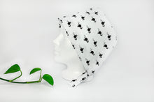 Load image into Gallery viewer, Left view of Scrub Cap with Black Flamingo print on White ground