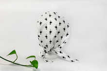 Charger l'image dans la galerie, Back view of Scrub Cap with Black Flamingo print on White ground