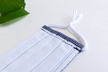 Charger l'image dans la galerie, Closeup of the back of a face mask showing a flannel cotton lining