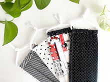 Charger l'image dans la galerie, Close up of four Face masks in various colours and prints