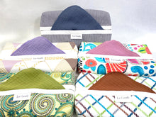 Load image into Gallery viewer, 5 dispenser boxes in cotton in 5 different patterns with coloured hankderchiefs folded inside
