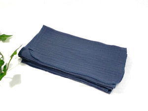 12 Grey cotton handkerchiefs folded in half