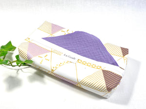 Cotton dispenser box in a Geometric pattern with 12 Lilac cotton handkerchiefs folded inside