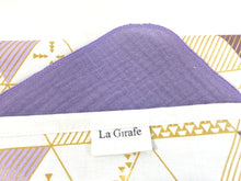 Load image into Gallery viewer, Close up of a Cotton dispenser box in a Geometric pattern with 12 Lilac cotton handkerchiefs
