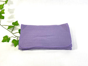 12 Lilac cotton handkerchiefs folded in two