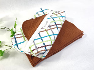 Cotton dispenser box in Ropes pattern with 12  Cinnamon cotton handkerchiefs folded inside