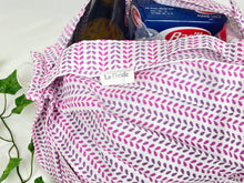 Load image into Gallery viewer, Close up of a cotton bag with handle with a small leave with grocery in it
