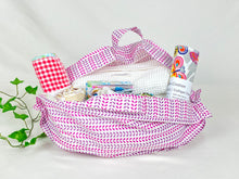 Charger l&#39;image dans la galerie, Cotton bag with handle with a small leaves pattern with various items inside of it
