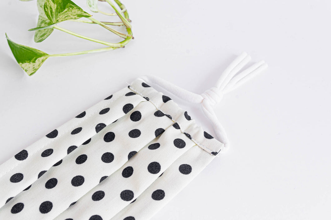Close up of Cotton cloth face mask, Black Polka Dots on White Ground