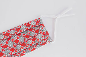 Close up of Cotton Pleated cloth face mask with printed Red Stars pattern