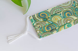 Close up of Cotton cloth face mask, Green Paisley pattern