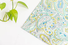 Load image into Gallery viewer, Closeup of the corner of a Green Paisley napkin
