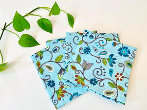 Four folded napkins with Blue Floral pattern