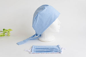 Side view of a Blue Cloth Scrub hat with a matching blue face mask