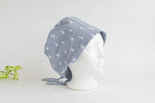 Load image into Gallery viewer, Side view of Cloth scrub hat with White Flamingo pattern on light Grey ground
