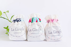 3 Ivory cloth pouches each containing 10 makeup remover pads