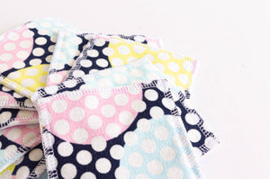 Pile of cloth pads with dots pattern 