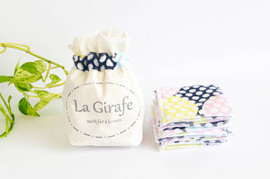 Set of 10 cloth pads with dots pattern with an Ivory cotton pouch