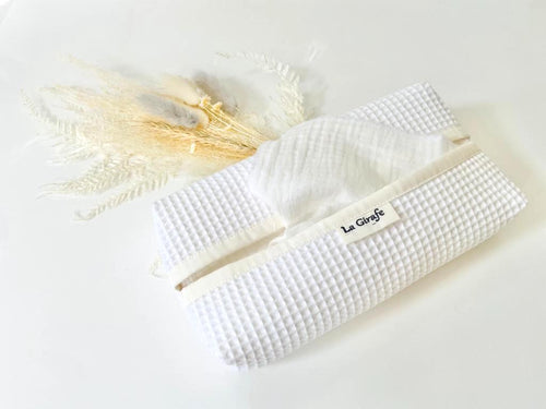 A White tissue dispenser box made of waffle cotton