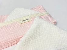 Load image into Gallery viewer, Close up of White coton handkerchiefs with a Pink Waffle dispenser box
