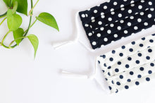 Load image into Gallery viewer, Close up of two face masks coton Black Polka dots on white ground and  White Dots on black ground
