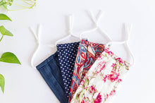 Load image into Gallery viewer, Four cotton cloth face masks, Polka Dots Navy, Red Paisley, Pink Floral and Blue Denim

