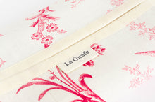 Load image into Gallery viewer, Close up of a cotton dispenser box with a Toile de Jouy pattern with a La Girafe label
